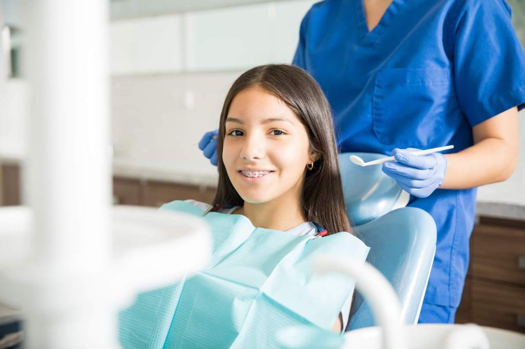 smiling girl with braces