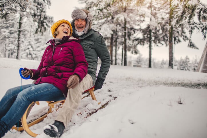 A couple on a sled