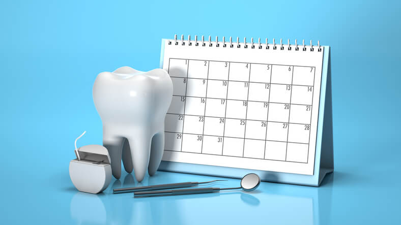 Some dental implements and a calendar