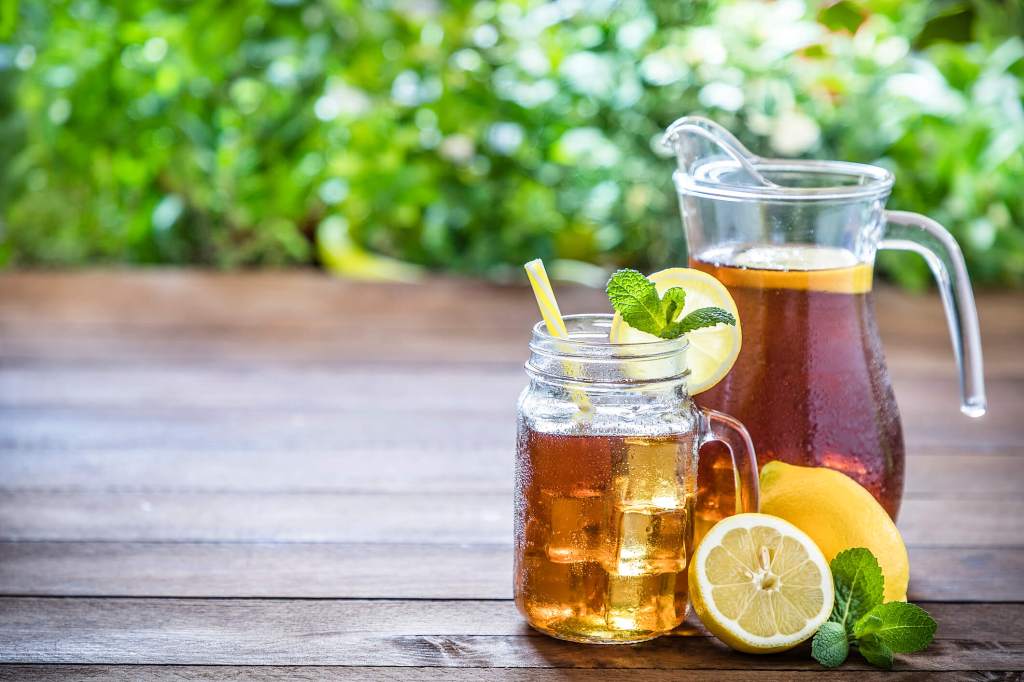 pitcher and a glass of iced tea