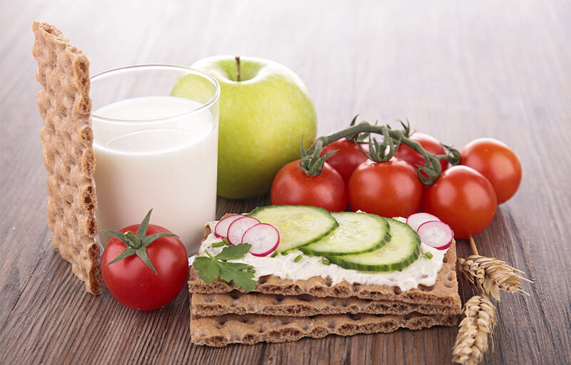 Milk an apple, some tomatoes, and some wafers