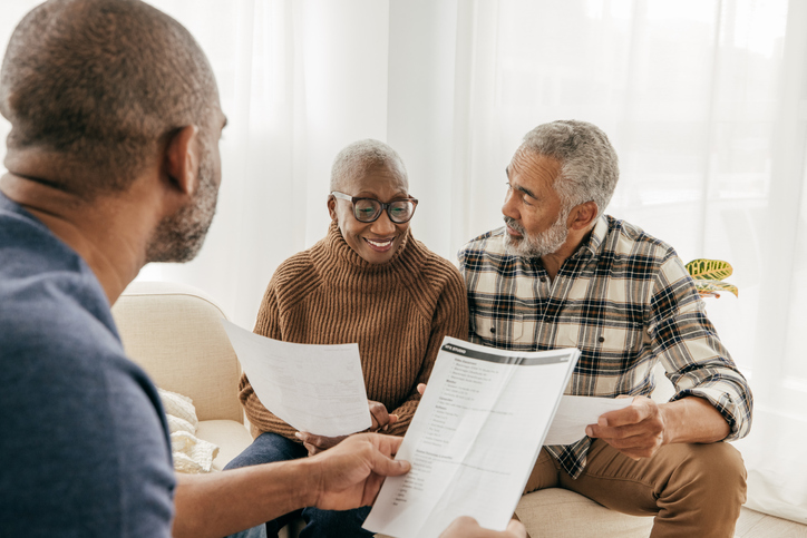 Senior couple on the meeting with Real Estate Agent