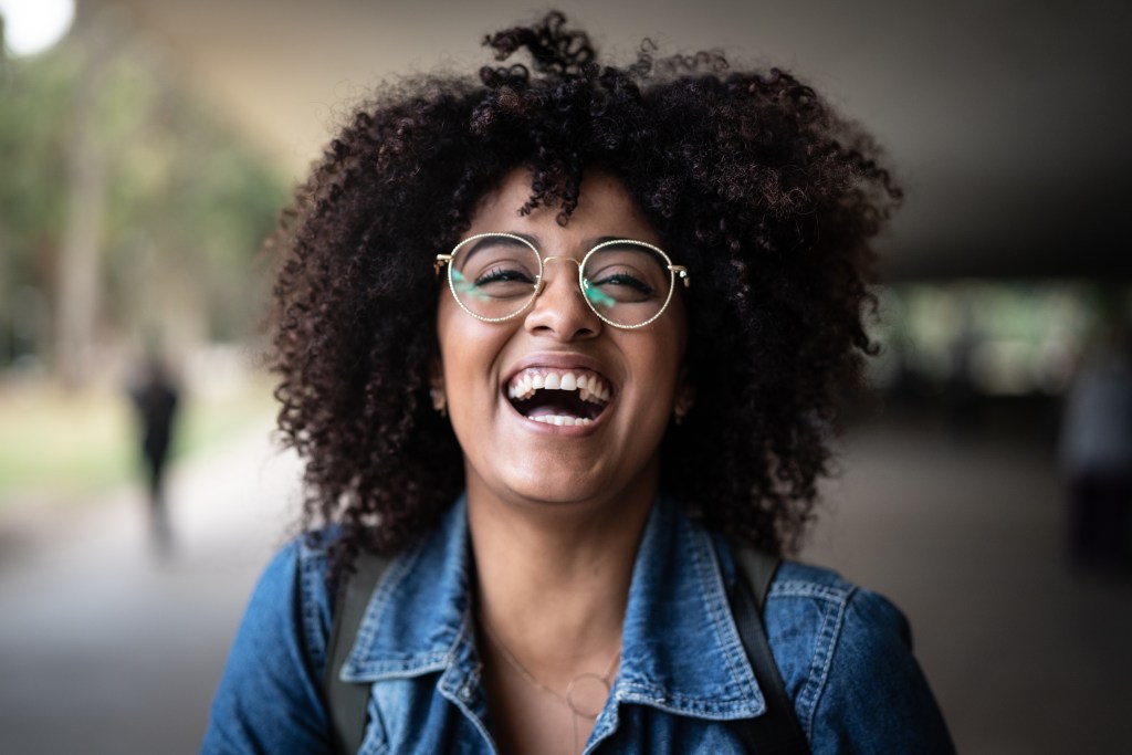 Portrait of happy woman in the park