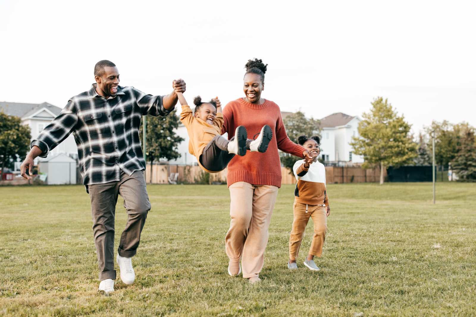 Family first: parents enjoying springtime outdoors with kids