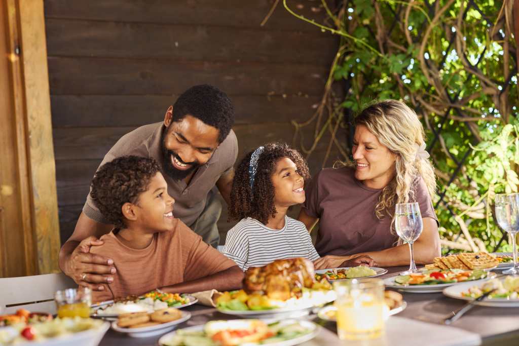 Interracial family dining