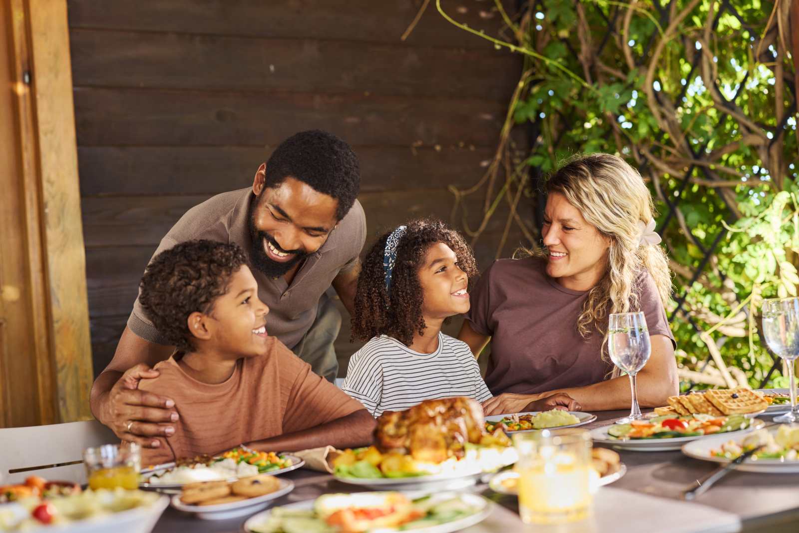 Interracial family dining